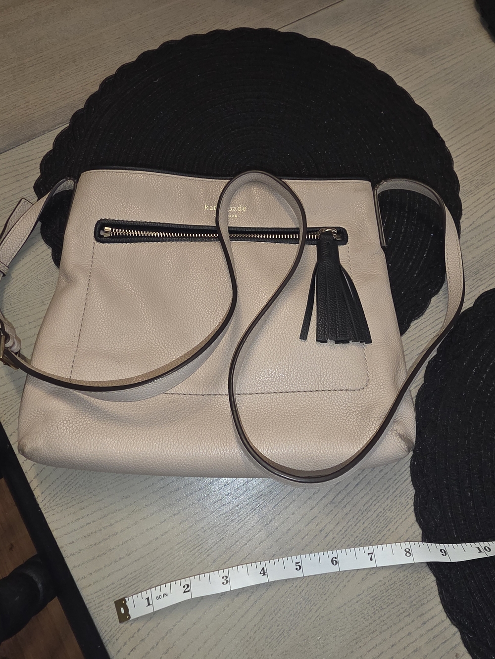 kate spade Pebbled Leather Crossbody in Light Blush with Black Tassel